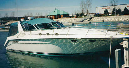 1994 Sea Ray Sundancer at the dock